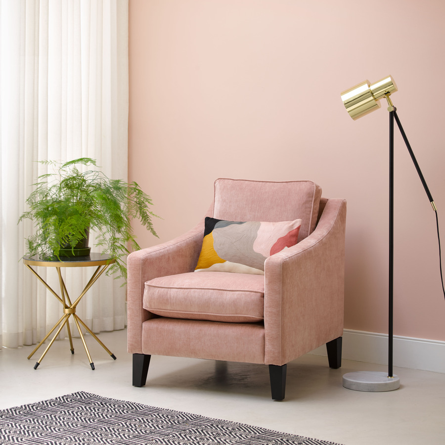 Iggy armchair in Pink Pavillion against a matching pink wall